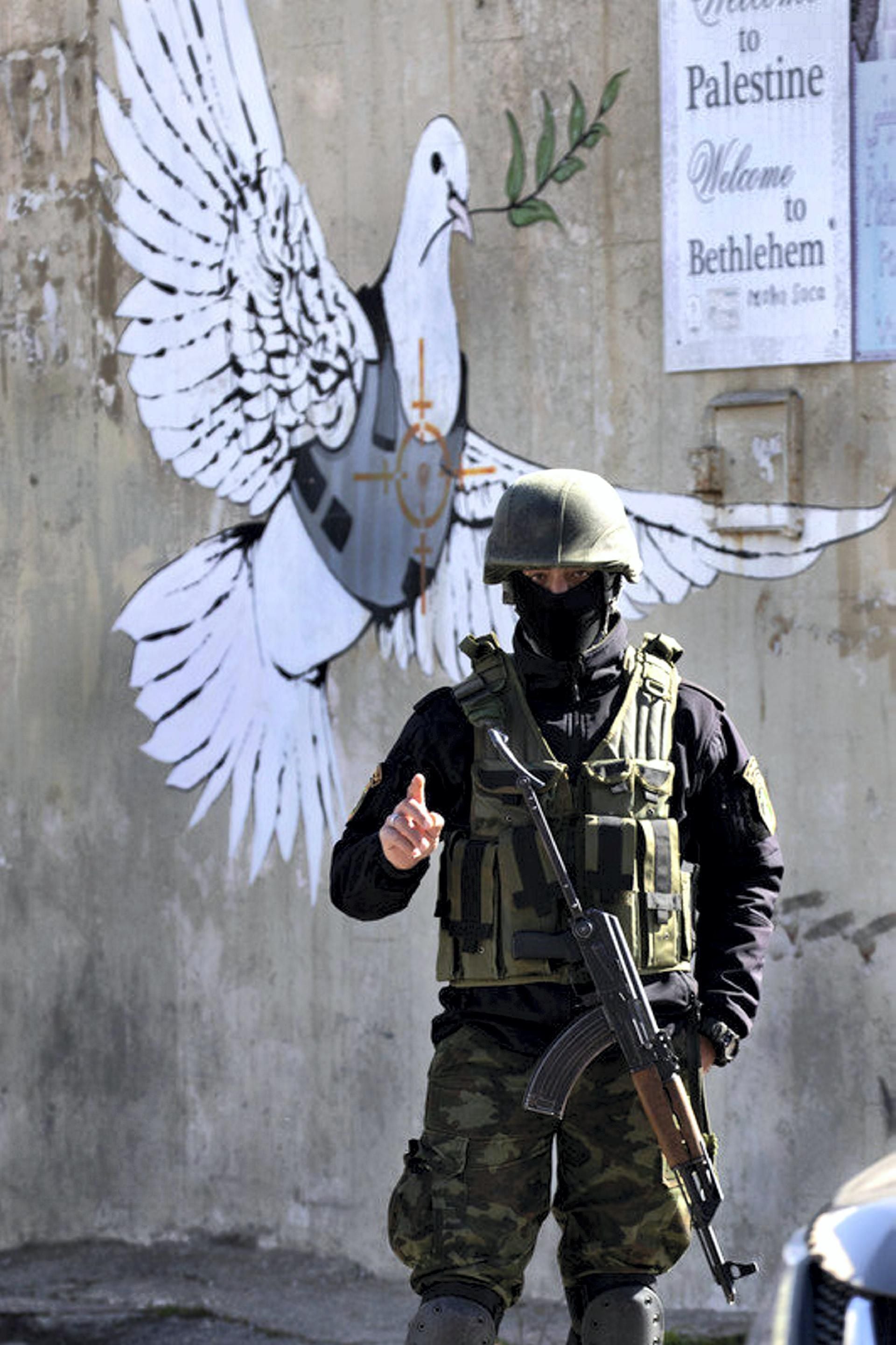 Banksy's West Bank dove - and the Palestinian shopowner who met