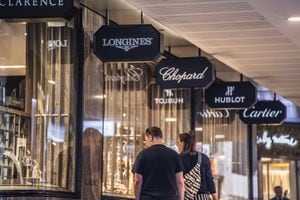 A shopper walks past the Swiss luxury watchmaker brand, Longines store seen  in Hong Kong. (Photo by Budrul Chukrut / SOPA Images/Sipa USA Stock Photo -  Alamy