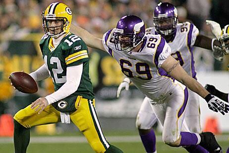 Jared Allen (#69) of the Minnesota Vikings puts pressure Matt