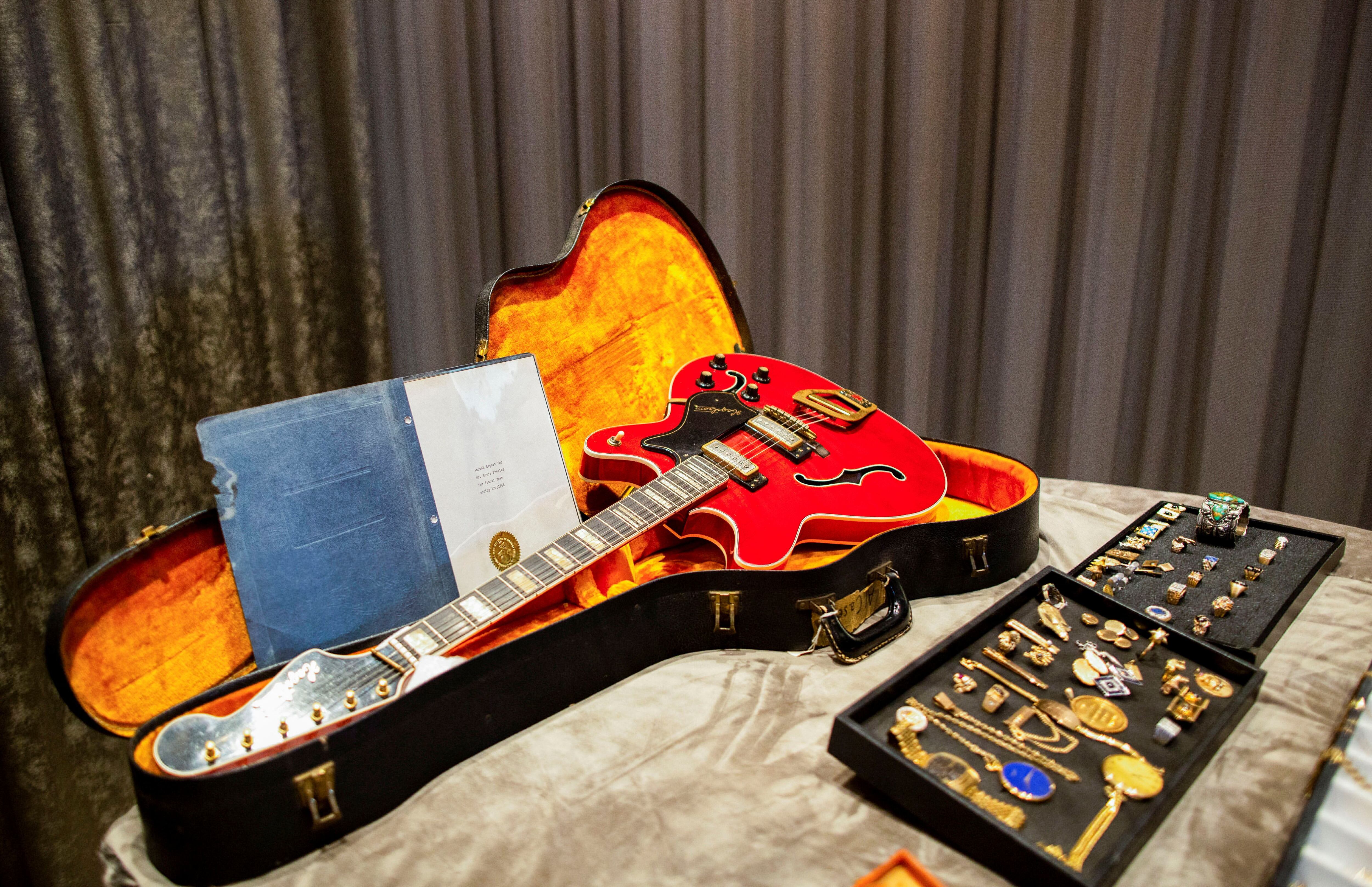 Elvis Presley jewelry, guitar up for auction