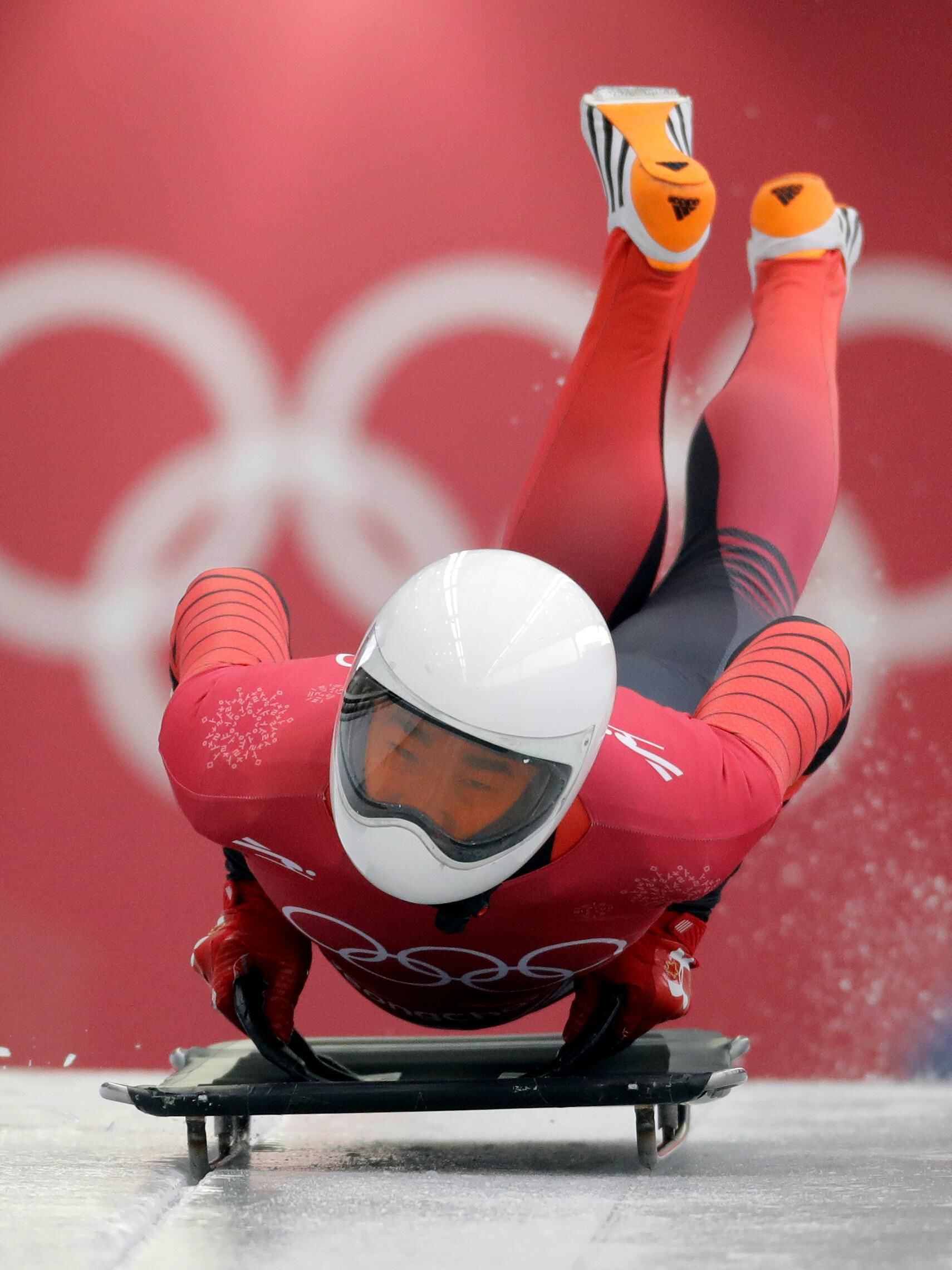 Flying Tomato' peels back years to win landmark snowboard gold