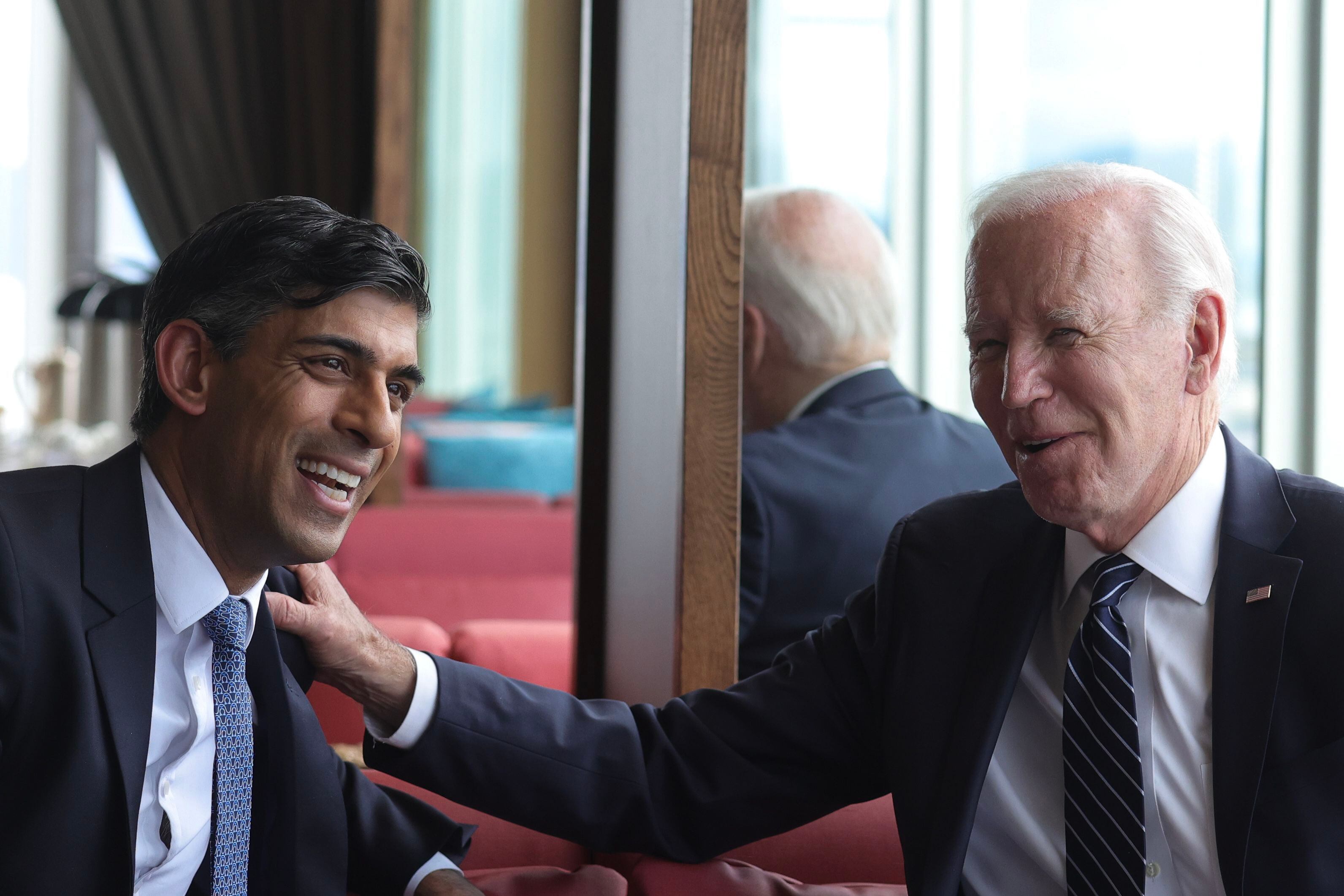 President Joe Biden greets the Washington Nationals' Racing