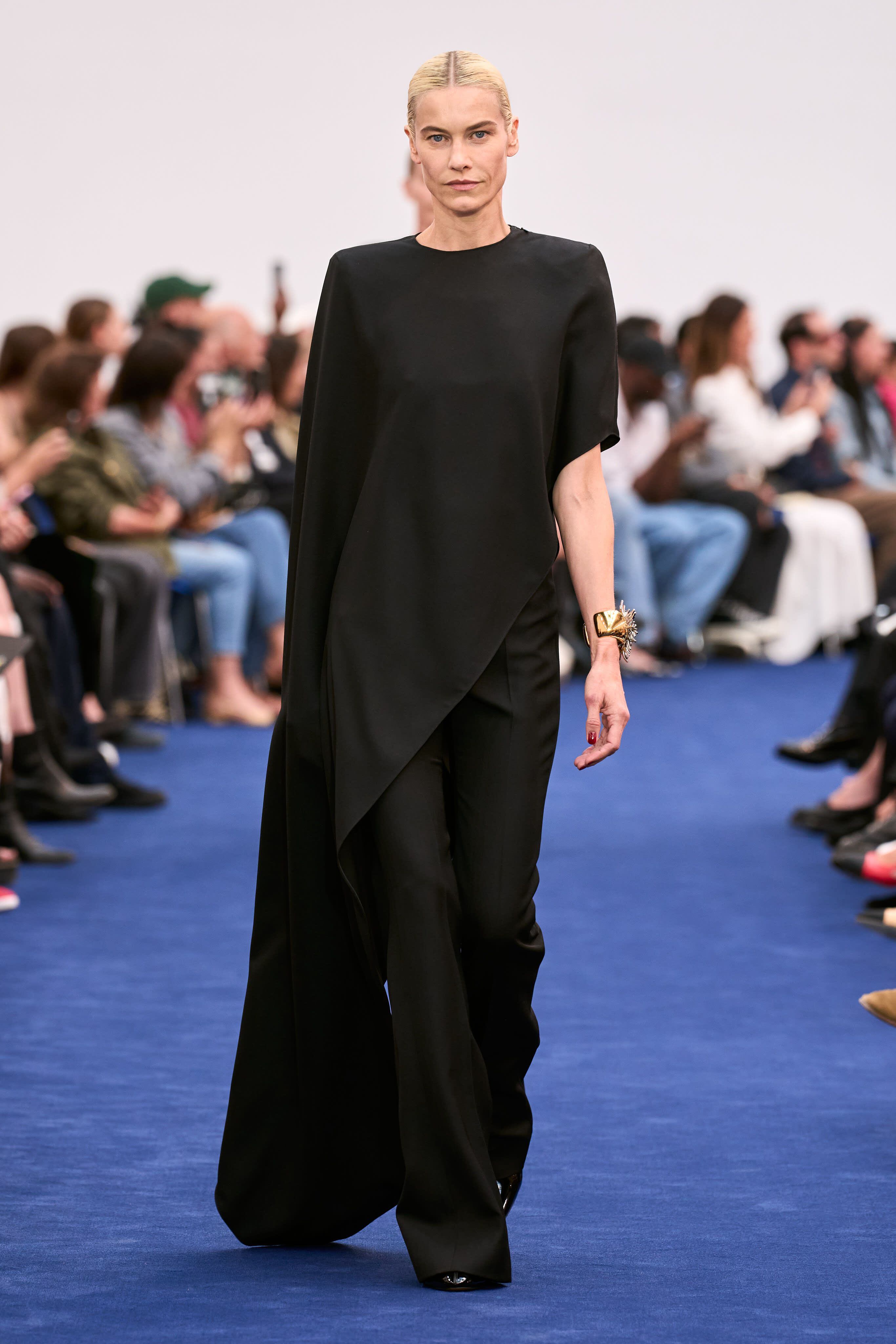 Carmen Kass walks the runway during the Valentino Haute Couture