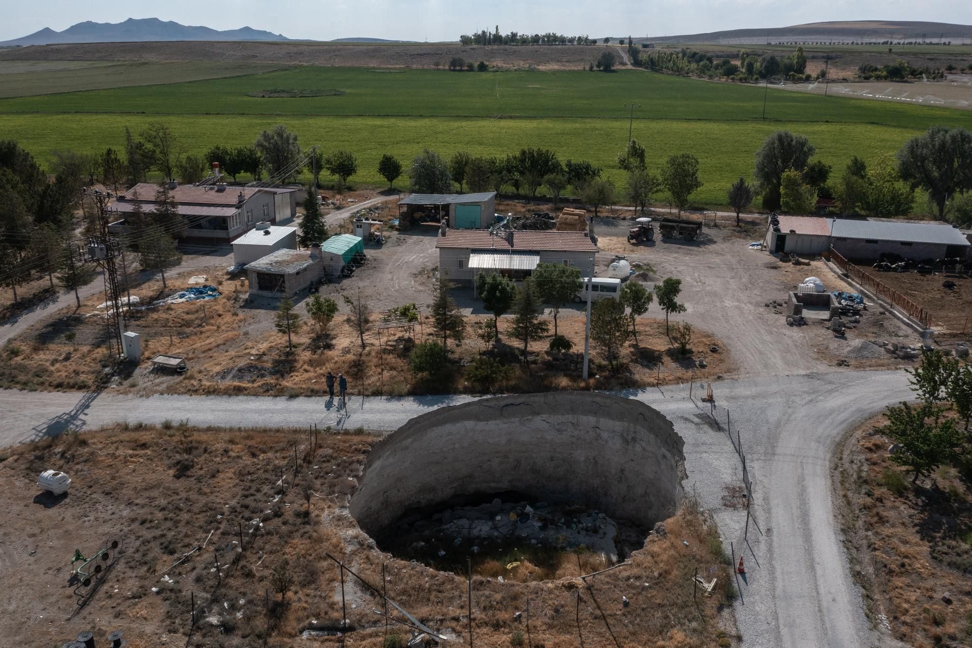 Giant sinkholes dot the landscape in Turkey's Karapinar in pictures