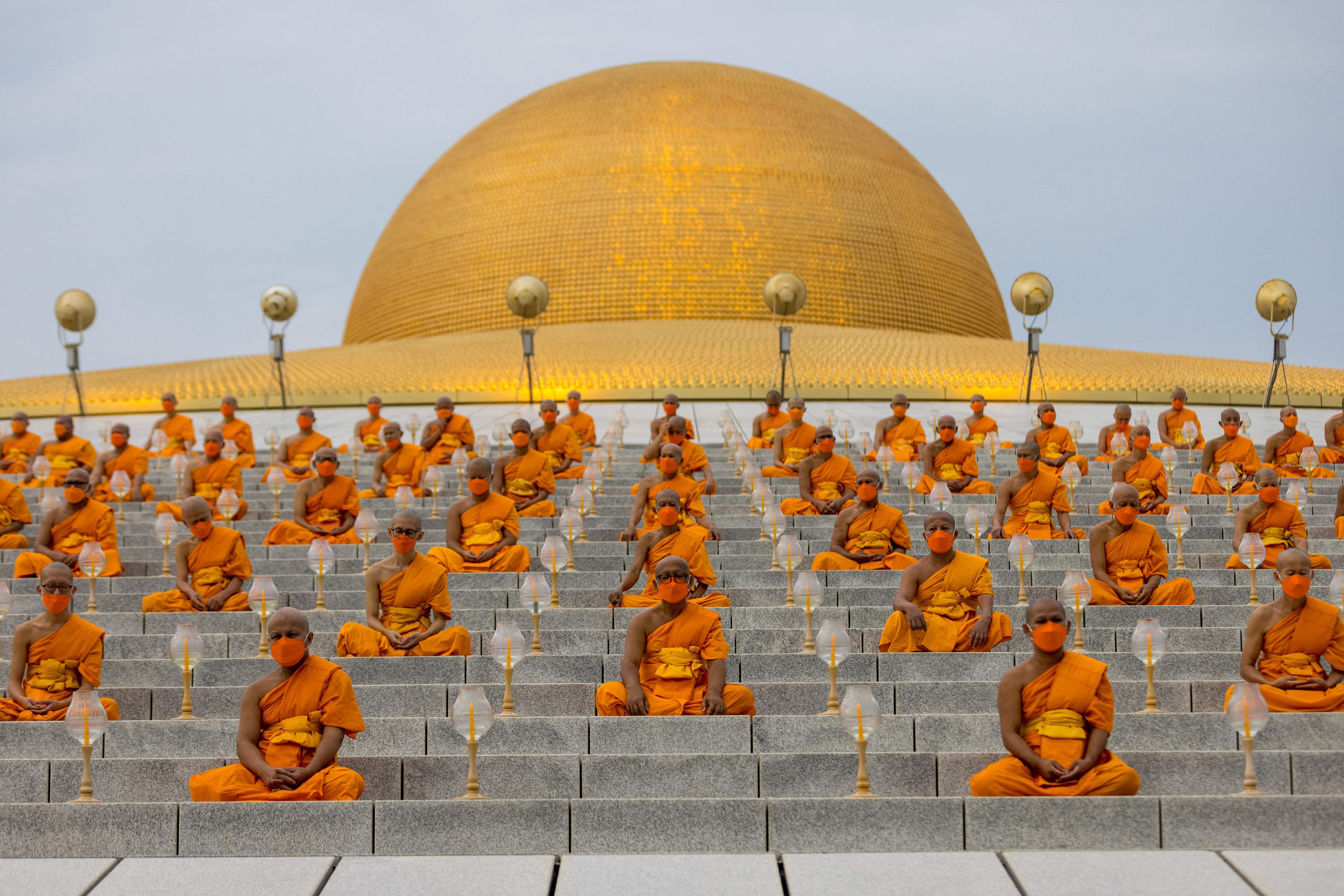 Today S Best Photos From Buddhist Monks To A Fishy Choice