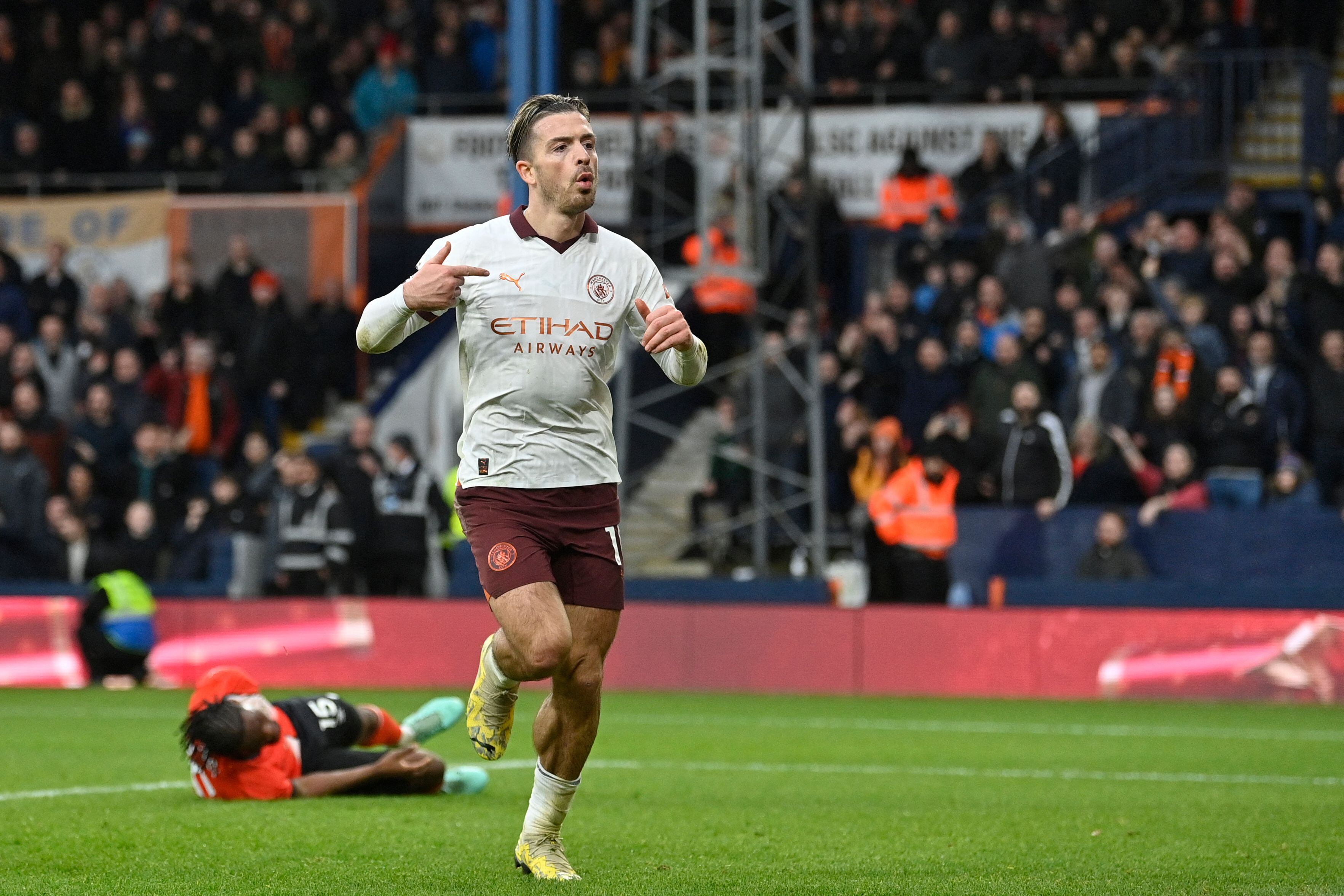 Jack Grealish puts Manchester City back on track with battling win over  Luton